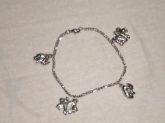 Pulseira com pingentes leao